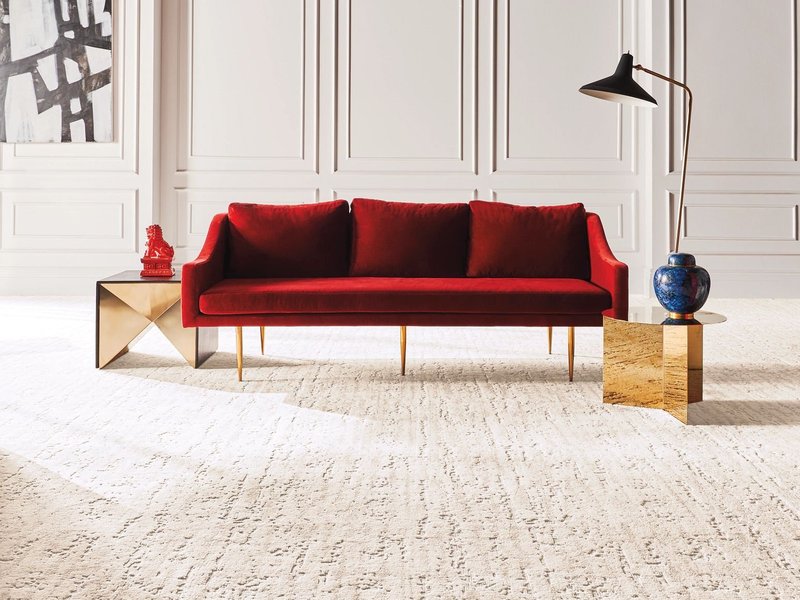 red sofa with beige carpet on Wade Hampton Blvd Ste area