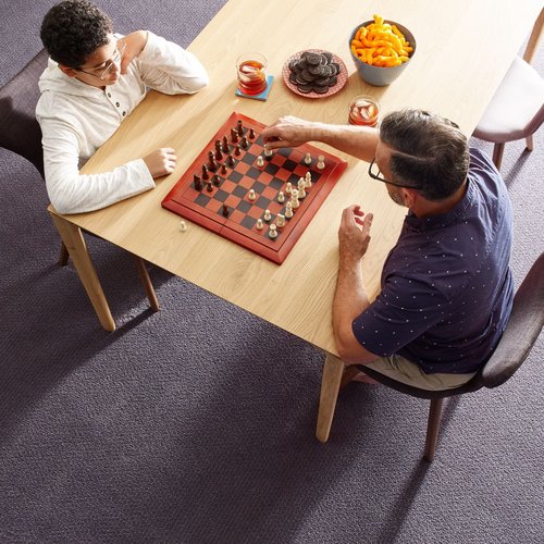 people playing chess from Wilkins Carpet and Tile Center in Taylors